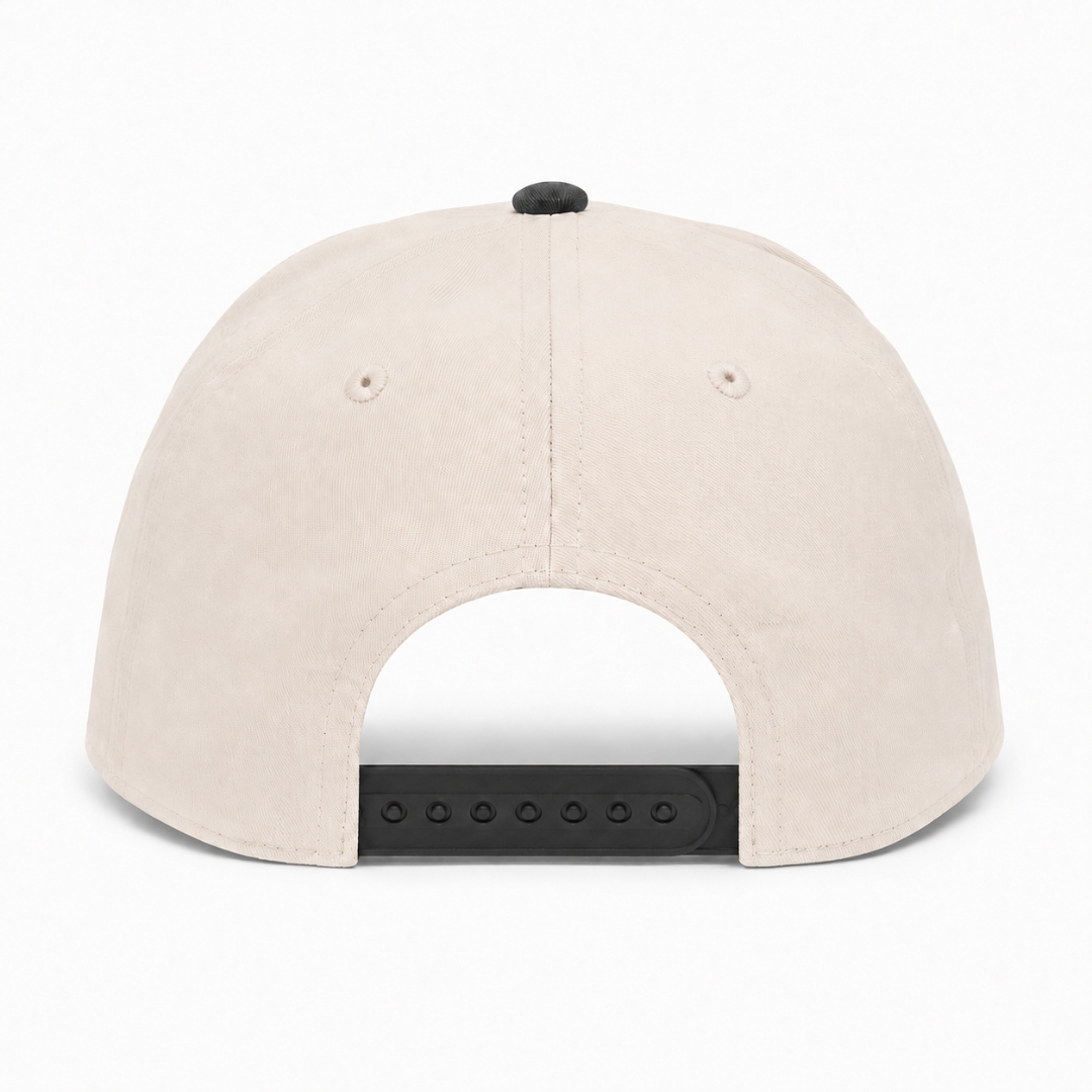 Snapback closure — plastic snap tab with eight posts on back of cream cap